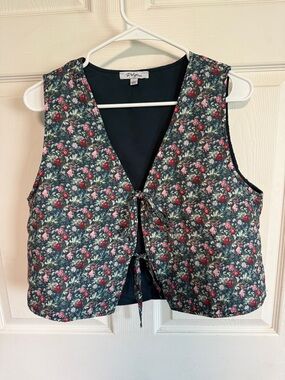 Polagram Navy Top with Subtle Floral Accent